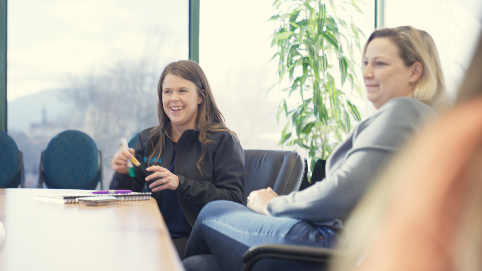 Tessa in a meeting